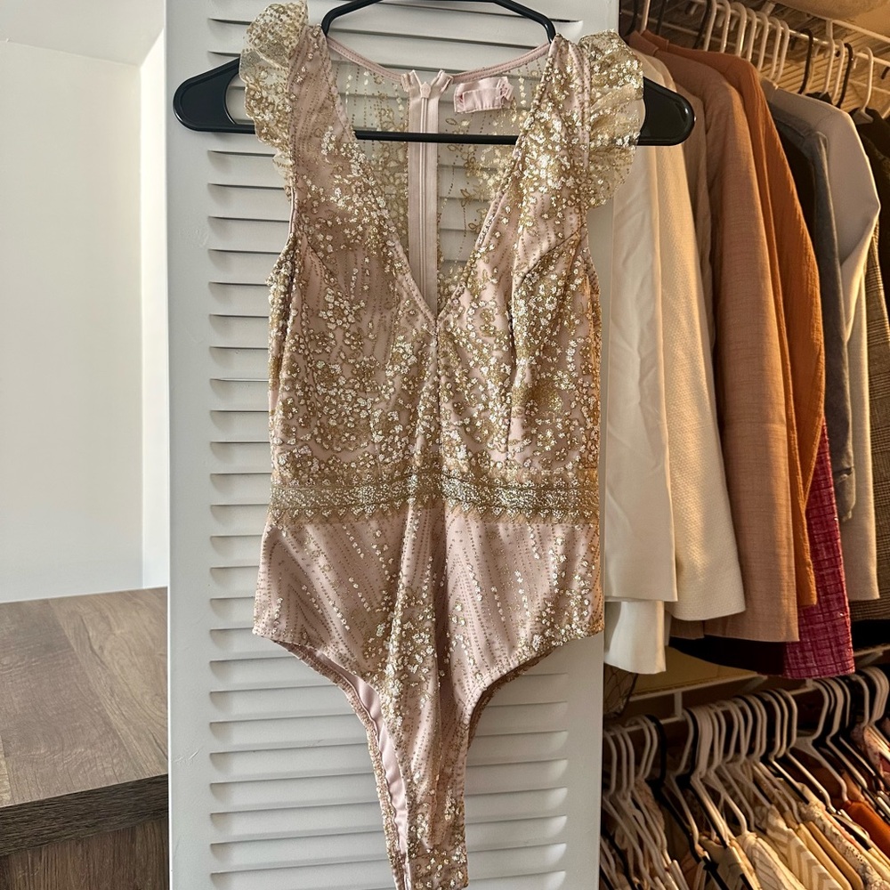Gently worn gold bodysuit from Showpo